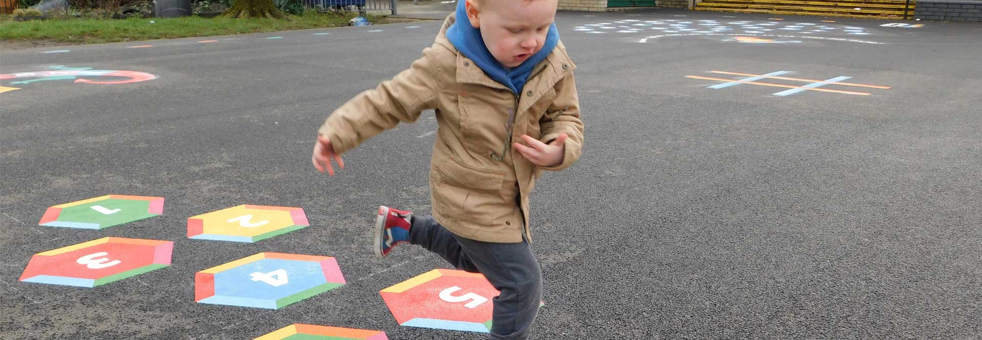 boy running playground