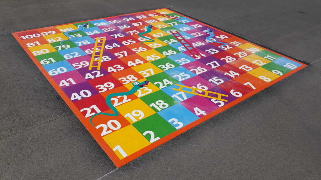 Thermoplastic snakes and ladders playground markings at a UK school